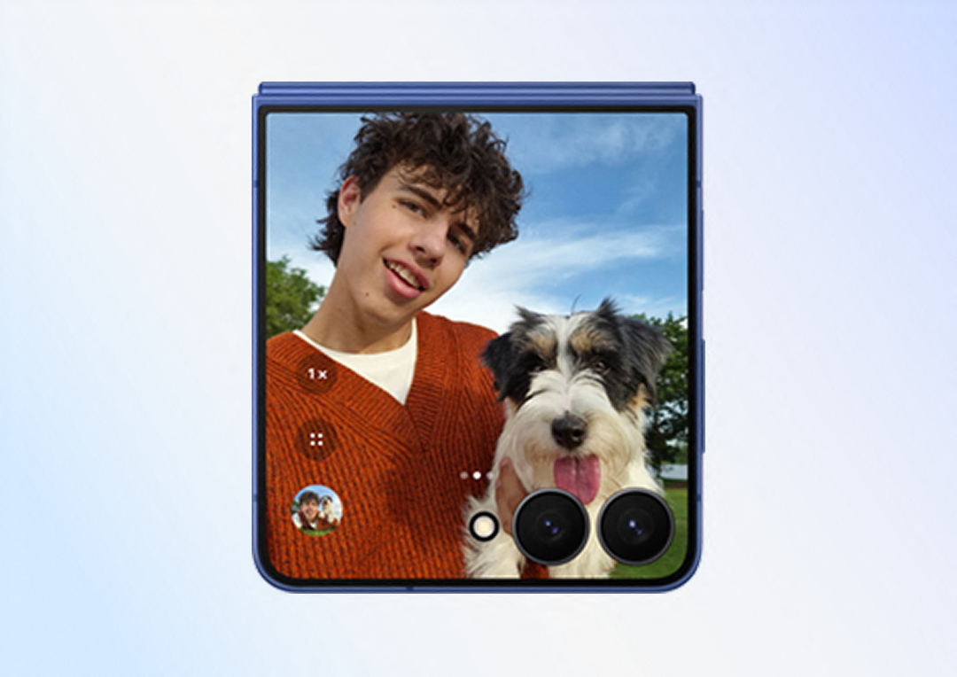 Detailed picture of a man holding a small dog taking a selfie