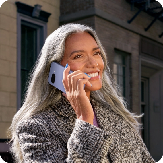 Woman talking on the Google Pixel 9a