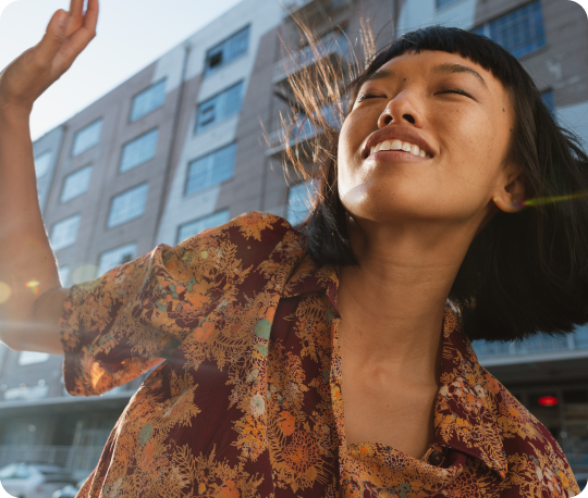 Woman taking a selfie looking carelessly free